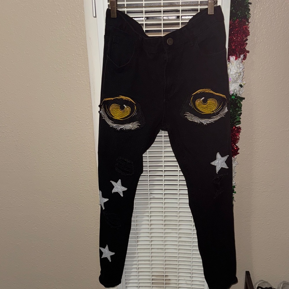 Men's Black Skinny Jeans with Eye and Star Design